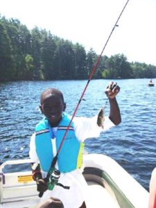 Junior camper fishing